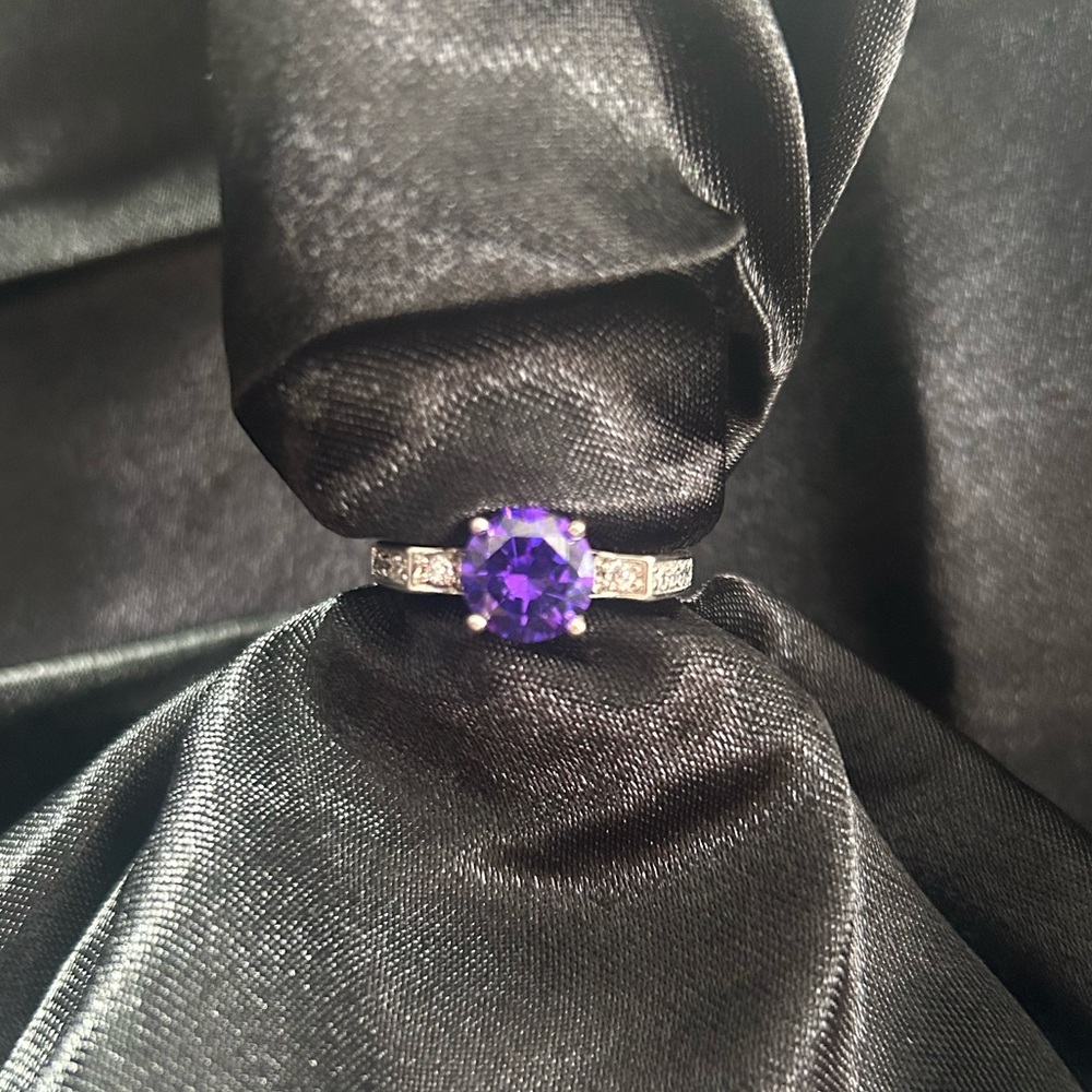 Purple Gem ring with gems in side